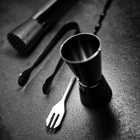 Cocktail fork amid cocktail set
