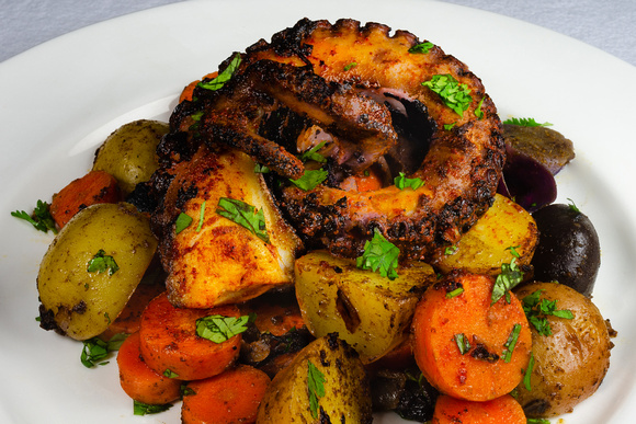 Octopus with cumin potatoes and carrots