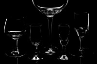Four glasses among a giant